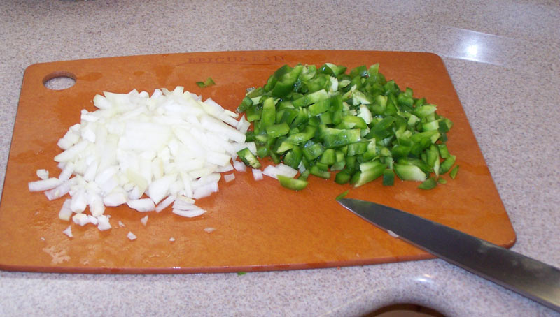Cut up the onion and green pepper