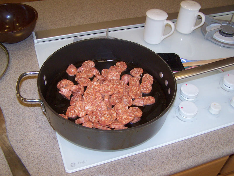 Put the sausage in the pan